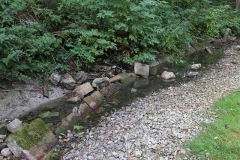 Headstones in  riverbed
